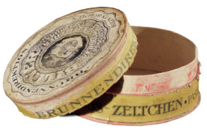 Krabička bílinských zažívacích pastilek z 19. století.